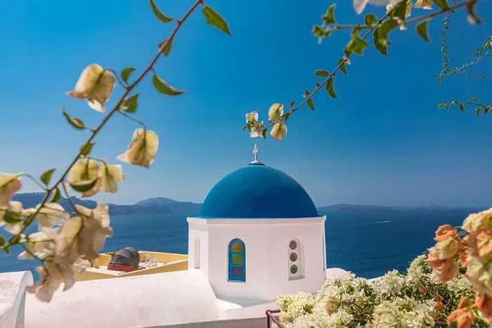 Framed Print : Relaxing and romantic view with white architecture in Santorini Greece, caldera view over blue sea and volcano island. Summer landscape for travelling Framed Print : Relaxing and romantic view with white architecture in Santorini Greece, caldera view over blue sea and volcano island. Summer landscape for travelling