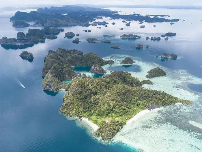 Framed Print : The remote limestone islands of Misool in Raja Ampat are surrounded by calm seas and healthy reefs. This tropical region has high marine biodiversity Framed Print : The remote limestone islands of Misool in Raja Ampat are surrounded by calm seas and healthy reefs. This tropical region has high marine biodiversity