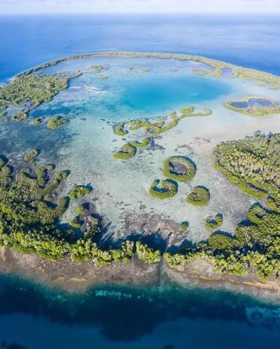 Framed Print : A remote tropical island in the Molucca Sea is fringed by mangrove forest surrounding a shallow lagoon. This island sits amid the Coral Triangle Framed Print : A remote tropical island in the Molucca Sea is fringed by mangrove forest surrounding a shallow lagoon. This island sits amid the Coral Triangle