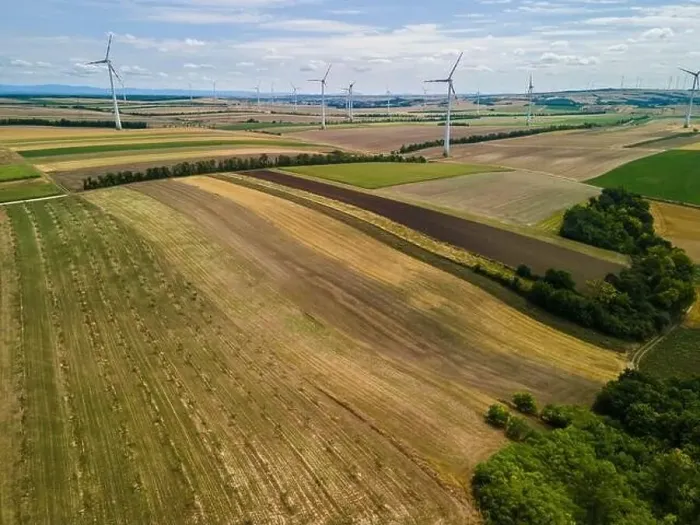Framed Print : Renewable Energy Wind Farm in Agriculture Fields in Countryside Drone Aerial View Framed Print : Renewable Energy Wind Farm in Agriculture Fields in Countryside Drone Aerial View