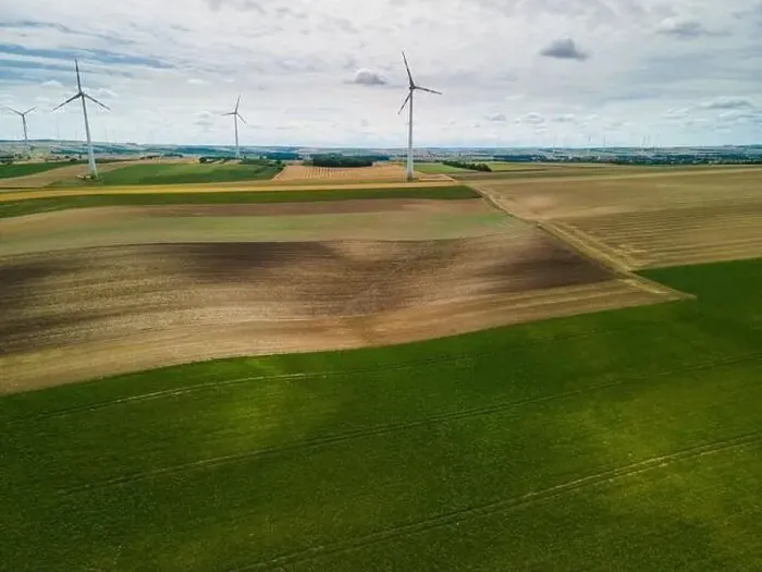 Framed Print : Renewable Energy Wind Farm in Agriculture Fields in Countryside Drone Aerial View Framed Print : Renewable Energy Wind Farm in Agriculture Fields in Countryside Drone Aerial View