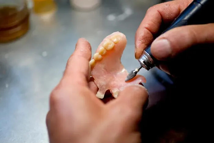 Framed Print : Repairing Artificial Human Teeth Framed Print : Repairing Artificial Human Teeth