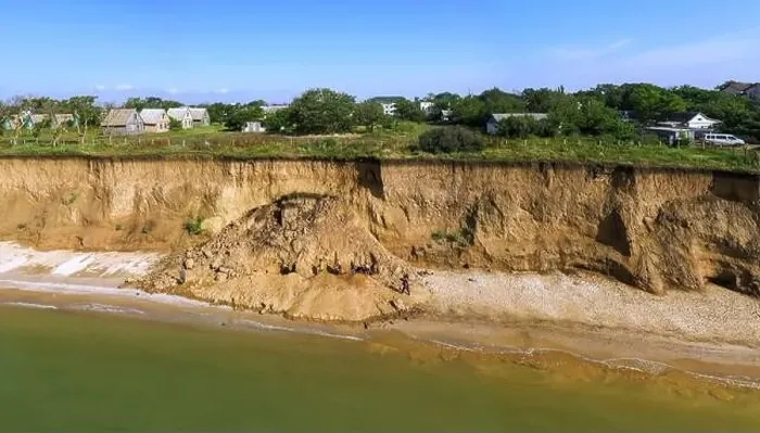 Framed Print : Rescue work after a landslide in Lebedevka Odessa region, Ukraine. Drone footage, morning time Framed Print : Rescue work after a landslide in Lebedevka Odessa region, Ukraine. Drone footage, morning time