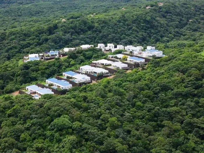 Framed Print : Residential villas in green hill background aerial drone view Framed Print : Residential villas in green hill background aerial drone view