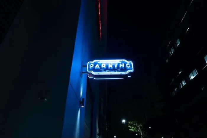 Framed Print : Retro Art Deco Neon Public Parking Signs at Night Framed Print : Retro Art Deco Neon Public Parking Signs at Night