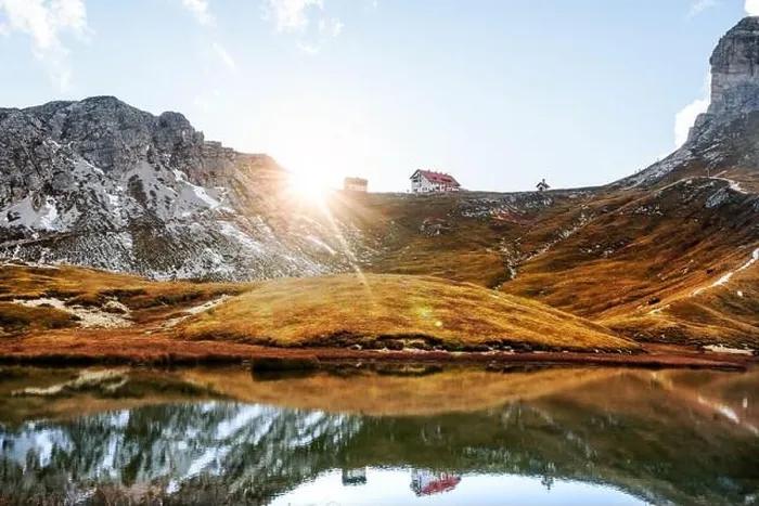 Framed Print : Rifugio Locatelli mirrored in clear turquoise water of alpine lake Piani in the Tre Cime Di Laveredo National Park, Dolomites, Italy