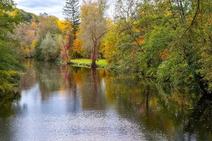 Framed Print : River Glan in Germany surrounded with trees in autumn colors
