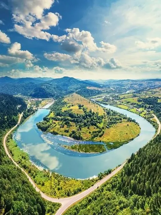 Framed Print : River meander in a mountain valley in summer. Drone view Framed Print : River meander in a mountain valley in summer. Drone view