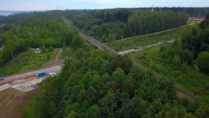 Framed Print : Road next to forest and river. Drone view Framed Print : Road next to forest and river. Drone view