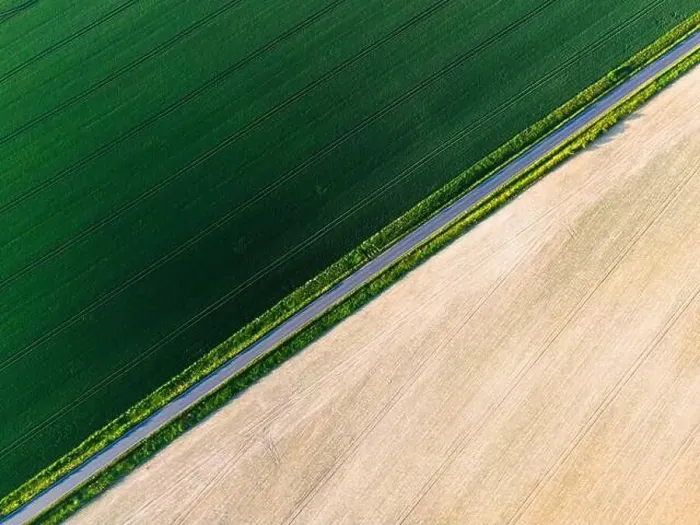 Framed Print : Road Trough Farm Fields. aerial Drone View Framed Print : Road Trough Farm Fields. aerial Drone View