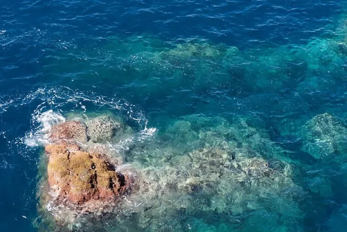 Framed Print : Rock in the clear water of Atlantic ocean. Madeira island, portugal Framed Print : Rock in the clear water of Atlantic ocean. Madeira island, portugal