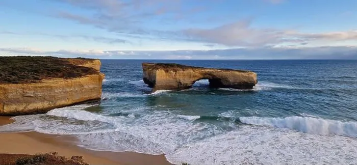 Framed Print : Rock, Sea & Sand Australia. A striking rock formation rising from the vibrant blue sea off the coast of Australia Framed Print : Rock, Sea & Sand Australia. A striking rock formation rising from the vibrant blue sea off the coast of Australia