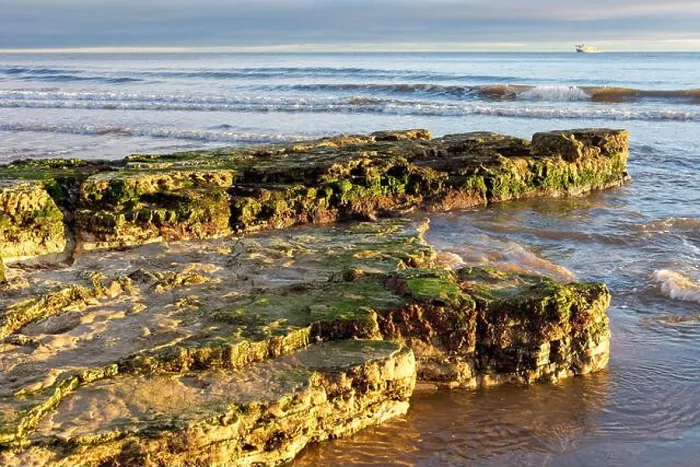 Framed Print : Rocks protrude out into the North Sea on Roker Beach near Sunderland in Tyne and Wear Framed Print : Rocks protrude out into the North Sea on Roker Beach near Sunderland in Tyne and Wear