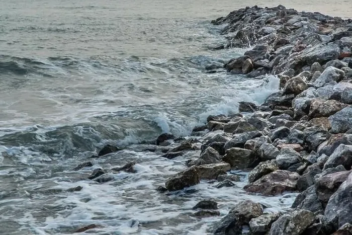 Framed Print : Rocks and sea : View of sea waves hitting rocks on the Calm beach in the morning. No focus, specifically Framed Print : Rocks and sea : View of sea waves hitting rocks on the Calm beach in the morning. No focus, specifically