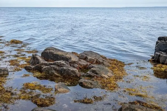 Framed Print : A rocky shoreline with blue water and a blu sky in the background. Picture from Skalderviken, southern Sweden Framed Print : A rocky shoreline with blue water and a blu sky in the background. Picture from Skalderviken, southern Sweden