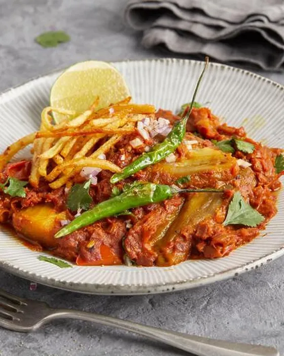 Framed Print : Rogan josh with eggplant on a plate – a spicy vegan curry inspired by Indian cuisine Framed Print : Rogan josh with eggplant on a plate – a spicy vegan curry inspired by Indian cuisine