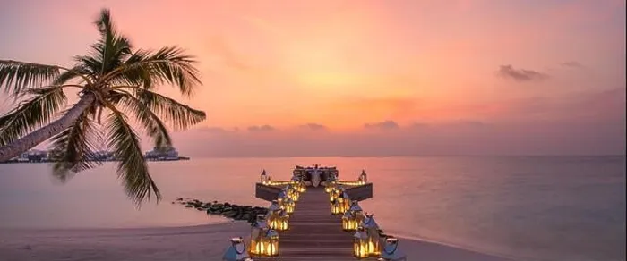 Framed Print : Romantic dinner on the beach with sunset, candles with palm leaves and sunset sky and sea. Amazing view, honeymoon or anniversary dinner landscape Framed Print : Romantic dinner on the beach with sunset, candles with palm leaves and sunset sky and sea. Amazing view, honeymoon or anniversary dinner landscape