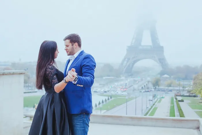 Framed Print : romantic moment near Eiffel tower, portrait of couple in love Framed Print : romantic moment near Eiffel tower, portrait of couple in love