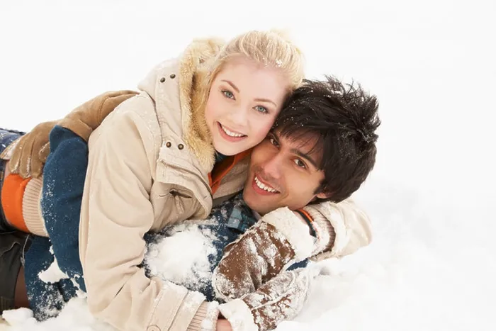 Framed Print : Romantic Teenage Couple Having Fun In Snow Framed Print : Romantic Teenage Couple Having Fun In Snow