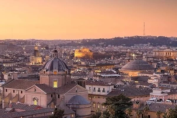 Rome, Italy with the domes of the Church of the Gesù and the Pantheon at dusk