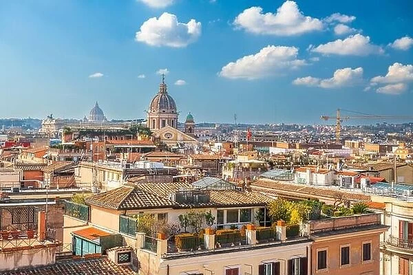 Rome, Italy rooftop skyline in the afternoon with the Vatican in the distance