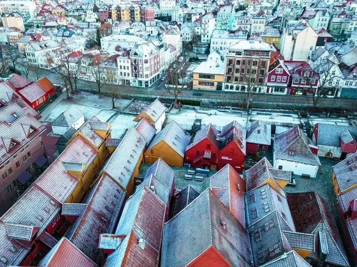 Framed Print : Roofs Covered with Snow. Aerial View