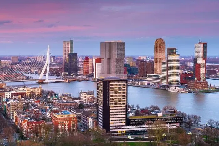 Framed Print : Rotterdam, Netherlands, city skyline over the Nieuwe Maas River at twilight Framed Print : Rotterdam, Netherlands, city skyline over the Nieuwe Maas River at twilight