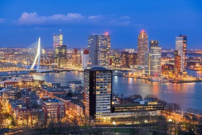 Framed Print : Rotterdam, Netherlands, city skyline over the Nieuwe Maas River at twilight Framed Print : Rotterdam, Netherlands, city skyline over the Nieuwe Maas River at twilight