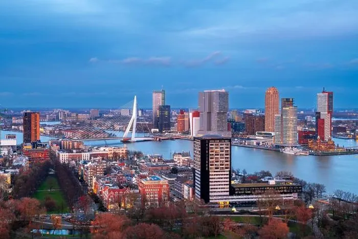 Framed Print : Rotterdam, Netherlands, city skyline over the Nieuwe Maas River at twilight Framed Print : Rotterdam, Netherlands, city skyline over the Nieuwe Maas River at twilight