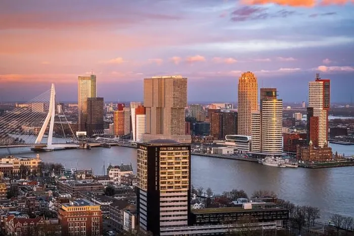 Framed Print : Rotterdam, Netherlands, city skyline over the Nieuwe Maas River at twilight Framed Print : Rotterdam, Netherlands, city skyline over the Nieuwe Maas River at twilight