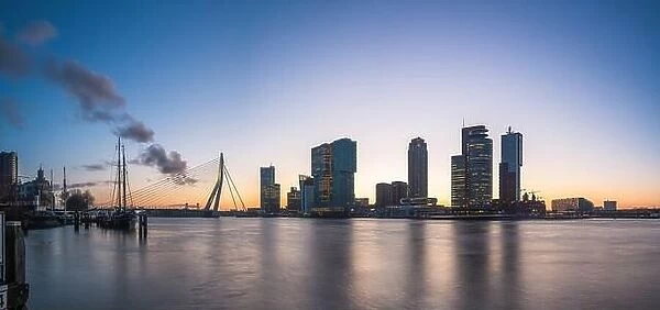 Rotterdam, Netherlands, city skyline on the river at twilight