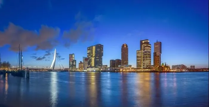Framed Print : Rotterdam, Netherlands, city skyline on the river at twilight Framed Print : Rotterdam, Netherlands, city skyline on the river at twilight