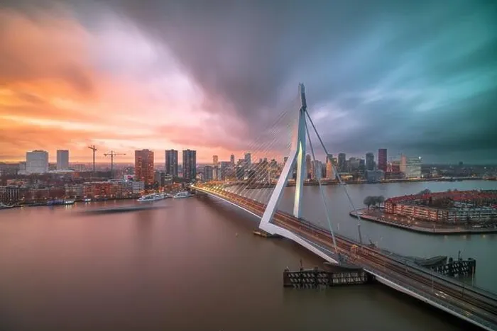 Framed Print : Rotterdam, Netherlands, city skyline over the river at twilight Framed Print : Rotterdam, Netherlands, city skyline over the river at twilight
