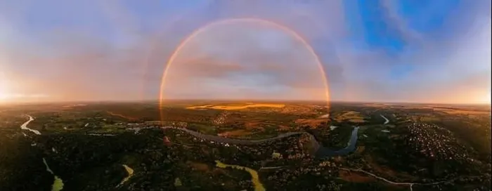 Framed Print : Round rainbow over the river on a summer evening Framed Print : Round rainbow over the river on a summer evening