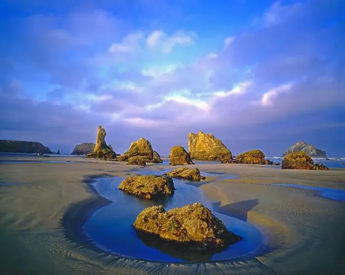 Framed Print : Rugged rock formations along the shoreline with tide pools at Bandon State Natural Area on the Oregon coast; Bandon Framed Print : Rugged rock formations along the shoreline with tide pools at Bandon State Natural Area on the Oregon coast; Bandon