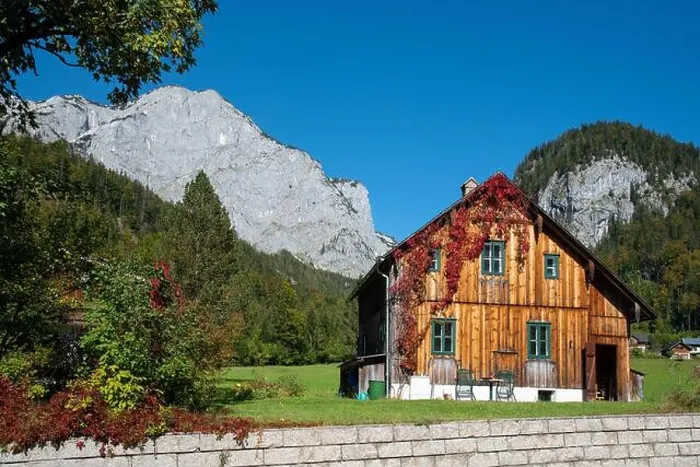 Framed Print : Rural country house with mountains in the background, Grundlsee, Styria, Austria Framed Print : Rural country house with mountains in the background, Grundlsee, Styria, Austria