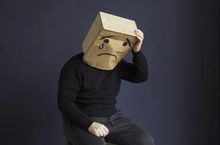 Framed Print : A sad man in a black turtleneck with a bag on his head Framed Print : A sad man in a black turtleneck with a bag on his head