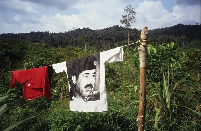 Framed Print : Saddam Hussein T-shirt hanging on washing line, Borneo Sarawak peoples Framed Print : Saddam Hussein T-shirt hanging on washing line, Borneo Sarawak peoples