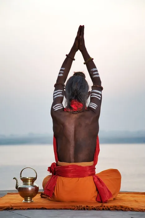 Framed Print : Sadhu or holy man performing manas puja Ganges River Varanasi India Framed Print : Sadhu or holy man performing manas puja Ganges River Varanasi India