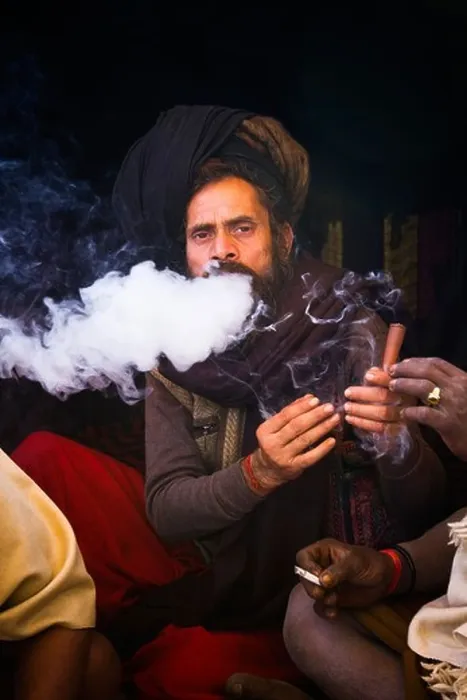 Framed Print : Sadhu smoking a chilam in Kumbha Mela, Allahabad, Uttar Pradesh, India Framed Print : Sadhu smoking a chilam in Kumbha Mela, Allahabad, Uttar Pradesh, India