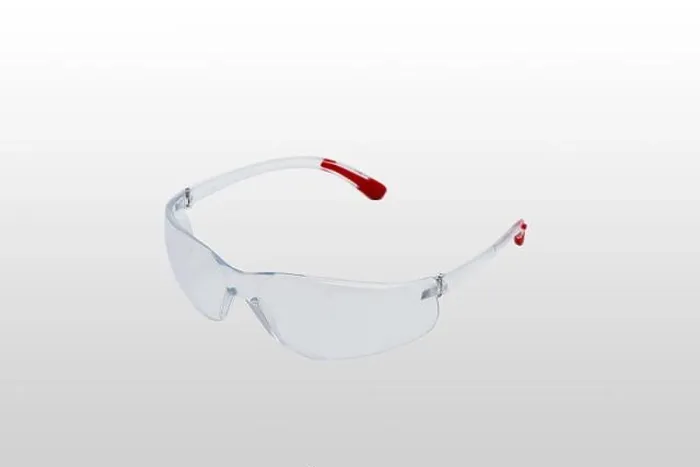 Framed Print : Safety glasses are transparent. Close-up. Isolated on a gray background Framed Print : Safety glasses are transparent. Close-up. Isolated on a gray background