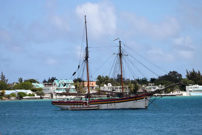 Framed Print : Sailing boat moored in a bay on the island of Mauritius Framed Print : Sailing boat moored in a bay on the island of Mauritius
