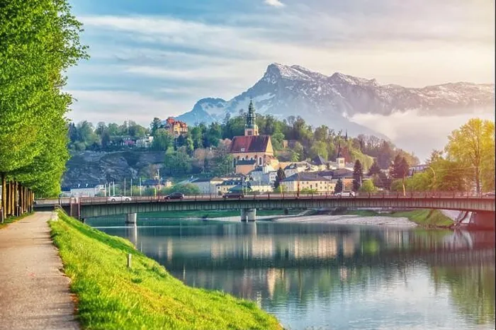 Framed Print : Salzburg sunset light and reflection of the city in warm lights. Austria Framed Print : Salzburg sunset light and reflection of the city in warm lights. Austria