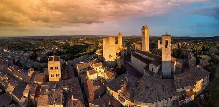 Framed Print : San Gimignano - one of the most beautiful medieval towns in Tuscany, Italy. aerial view of towers over sunset Framed Print : San Gimignano - one of the most beautiful medieval towns in Tuscany, Italy. aerial view of towers over sunset
