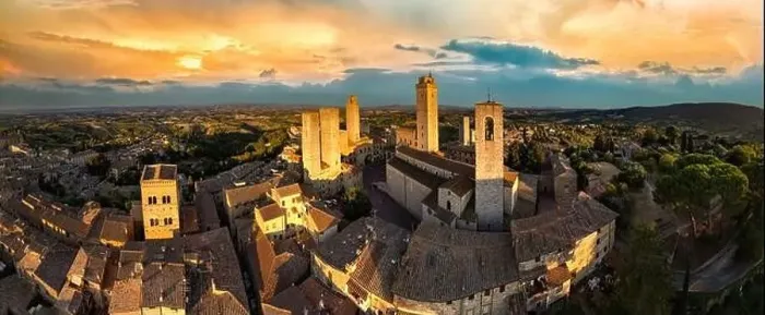 Framed Print : San Gimignano - one of the most beautiful medieval towns in Tuscany, Italy. aerial view of towers over sunset Framed Print : San Gimignano - one of the most beautiful medieval towns in Tuscany, Italy. aerial view of towers over sunset