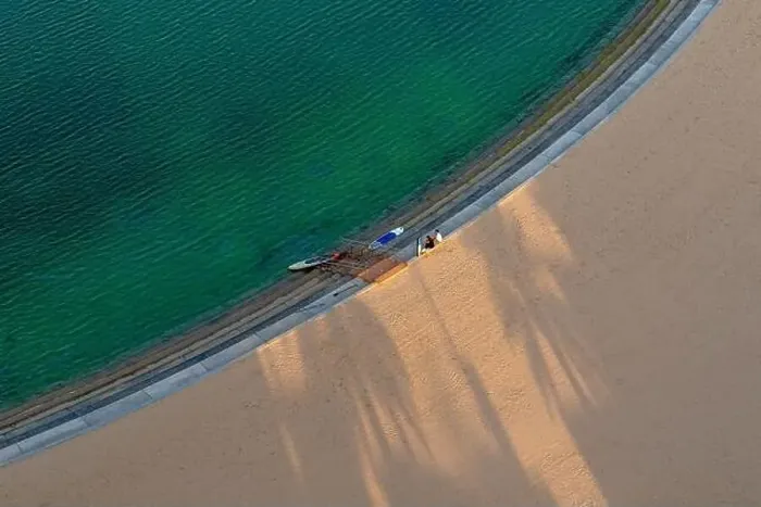 Framed Print : Sand beach aerial, top view of a beautiful sandy beach aerial shot with the blue waves rolling into the shore Framed Print : Sand beach aerial, top view of a beautiful sandy beach aerial shot with the blue waves rolling into the shore