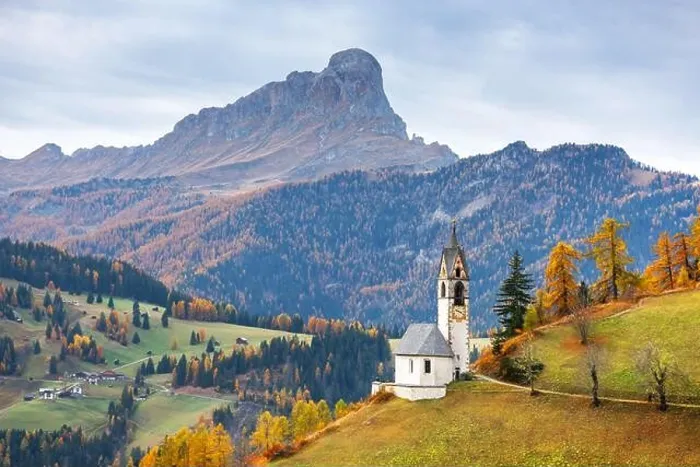 Framed Print : Santa Barbara church at the autumn Dolomite Alps. Amazing landscape with small chapel on sunny meadow at San Genesio village location Framed Print : Santa Barbara church at the autumn Dolomite Alps. Amazing landscape with small chapel on sunny meadow at San Genesio village location