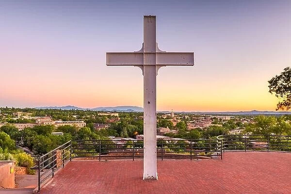 Santa Fe, New Mexico, USA downtown skyline at dusk with the cross