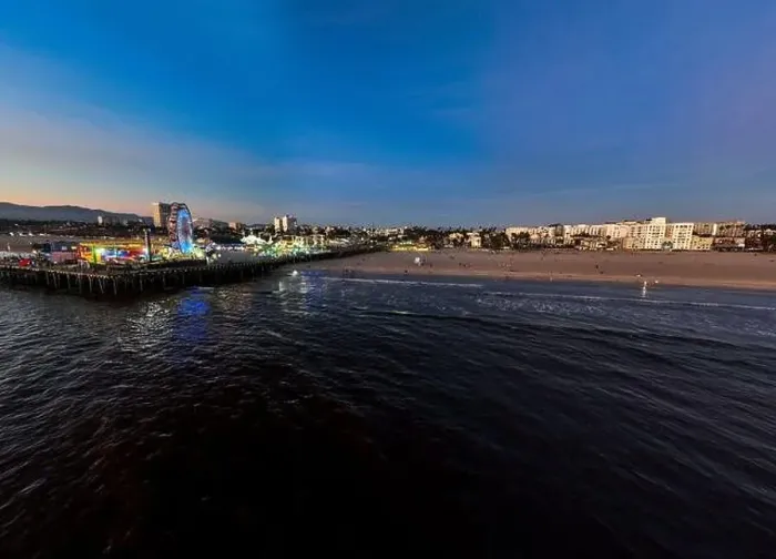 Framed Print : The Santa Monica Beach Pier in California, with Pacific Park at Sunset from a UAV Drone View showing the City Lights Framed Print : The Santa Monica Beach Pier in California, with Pacific Park at Sunset from a UAV Drone View showing the City Lights