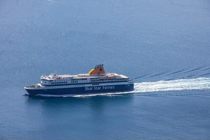 Framed Print : Santorini, Greece - 10.8.2019: Tourists arriving with ferries running on Aegeans sea at Santorini island, Greece